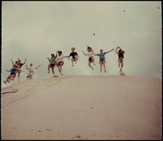 Sechelt Campers Jumping on Sand Dunes Photograph, 1985