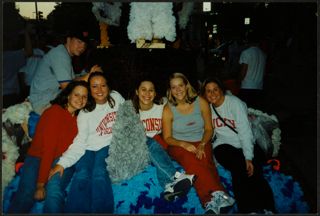 Gamma Chapter Members on Homecoming Parade Float Photograph, 1999
