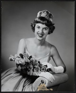 Carmen H. Anderson Holding Flowers Photograph, 1961