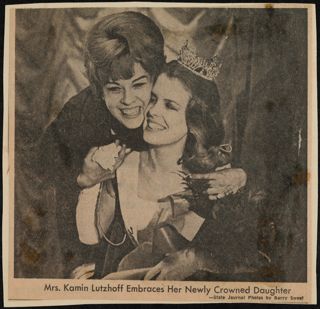 Mrs. Kamin Lutzhoff Embraces Her Newly Crowned Daughter Newspaper Clipping