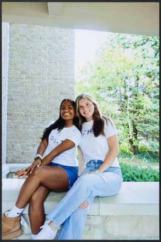 Two Unidentified Eta Zeta Chapter Members on Stone Wall Photograph 2, c. 2024