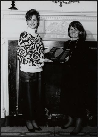 Joey Stiver and Sandy Solberg With Initiation Plaque Photograph 1, January 24, 1987