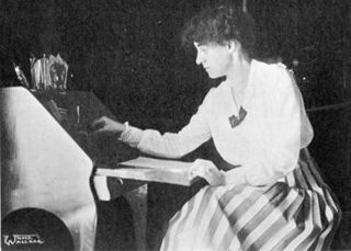 Lindsey Barbee Writing at Desk Photograph