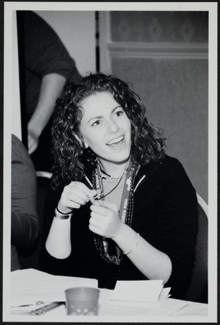 Executive Board Members Smiling at a Table Photograph