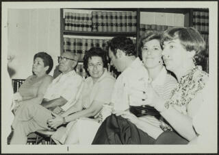 Miriam Aerman and Others Sitting at Event Photograph