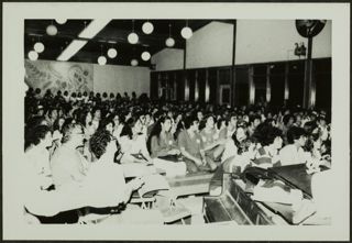 Attendees Singing at Convention Photograph