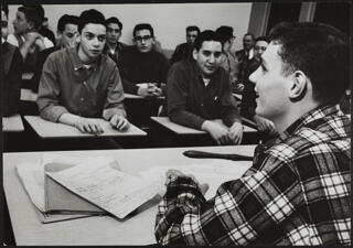 Alephs in Classroom Listening to Speaker Photograph