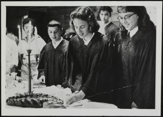 BBG Members Lighting Candles Photograph 1