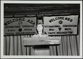 A BBG Standing at Podium at Convention Photograph, 1980
