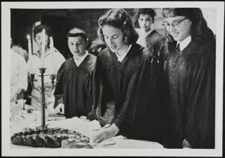 BBG Members Lighting Candles Photograph 2