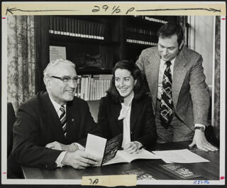 Jack Spitzer, Sidney Clearfield, and Virginia O'Brien Smiling Together at Desk Photograph