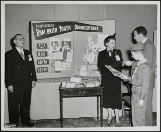 People Standing at BBYO Publications Display Photograph, c. 1952
