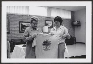 Anita Perlman and Julie Raskin Holding T-Shirt Photograph 2, February 12, 1981