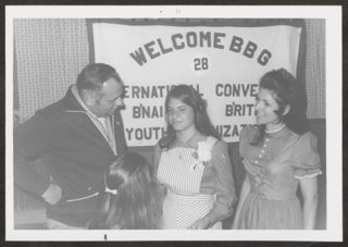 Two BBGs Speaking With Man at Convention Photograph, 1972