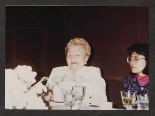 Anita Perlman Smiling at Table at BBYO International President Reunion Photograph, June 5-6, 1993