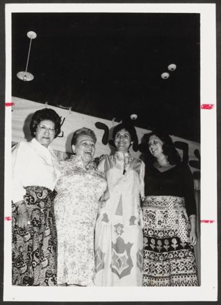 Anita Perlman Embracing Three Others on Stage Photograph 2, August 16-22, 1979