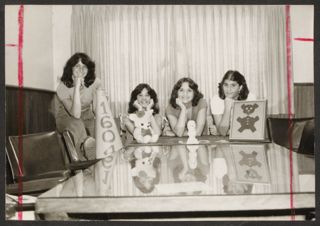 Lowry, Budnicoff, Benjamin, and Pollock Making Decorations Photograph, 1979