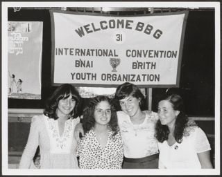 Four BBG Members Smiling at International Convention Photograph 2, 1975