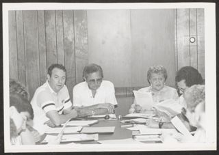 Anita Perlman Speaking at Executive Committee Meeting of Youth Commission Photograph, 1986