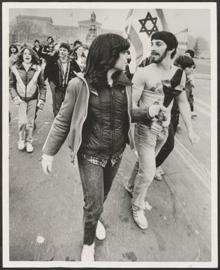 Stacey Singer and Adam Wasserman Participating in Hanukkah Torch Run Photograph, December 4, 1977