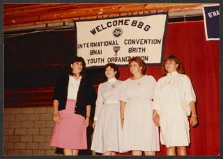 Four BBG Members on Stage at International Convention Photograph, August 17-23, 1983