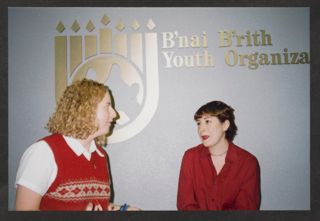Suzy Kemp Speaking With Unidentified Woman Photograph 1, 1997