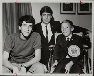 Lewis, Carver, and Poster Child Billy at Event Photograph