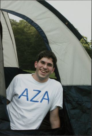 Member Smiling in Tent at Leadership Camp Photograph, July 12, 2006
