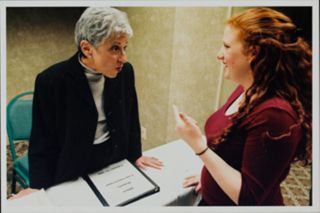 Lynn Schusterman and Member Speaking at February Executive Conference Photograph, February 14, 2002