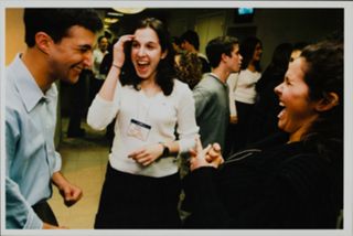 Paula Kwiskin and Other Members Sharing a Laugh Photograph