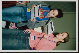 Two Members Reading Script Together Photograph, July 12, 2006