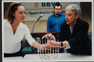 Lynn Schusterman and Two Members at Candle Lighting During February Executive Conference Photograph, 2006