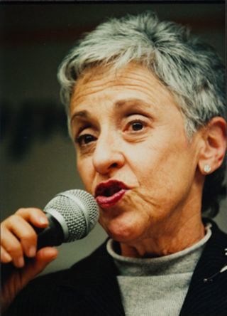 Lynn Schusterman Speaking on Microphone Photograph 2