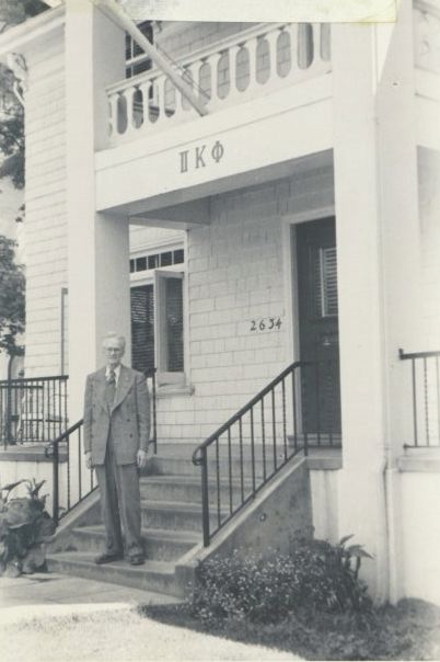 Theodore B. Kelly in front of the Gamma Chapter House