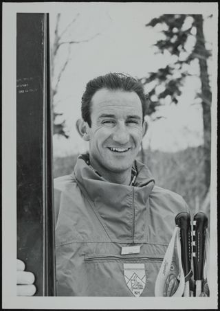 Paul Valar Holding Skis Photograph