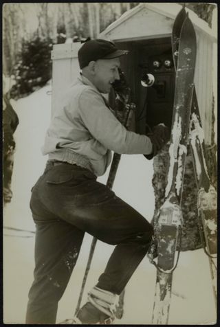 Man Using Trail Telephones Photograph, March 13, 1937