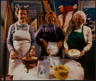 Three Women With NESM Cookbook Photograph