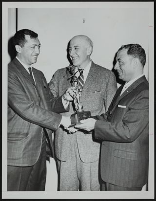 Three Men Holding LI Press Ski Trophy Photograph, 1961