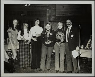 Five Women and Announcer With Trophies Photograph, 1970s
