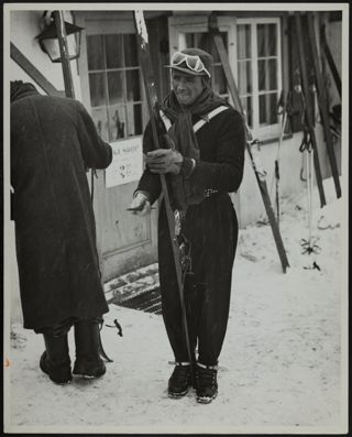 Emile Allais Holding Skis Photograph, January 1966