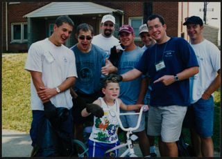 Seven Men at College of Engineered Leadership Community Service Photograph, August 1997