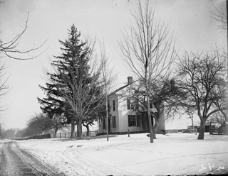Father's house from southwest (distant). 