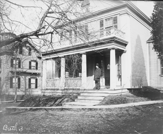 Davis on front porch of parsonage