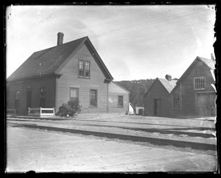 Ellsworth Falls Post Office, Shed, and Barn Adjacent to Railroad Tracks