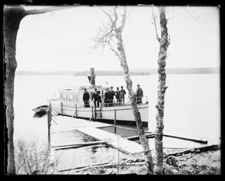 <em>The Senator</em> Docking with Men Disembarking