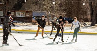 Students playing hockey