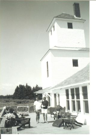 Old US life saving station owned by Frank Newlin pictured with Wife Kim & son Cooper