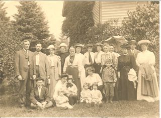 Guests in front of Gilley Cottage
