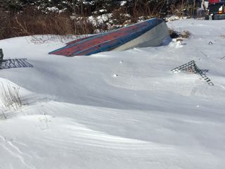 Snowy skiff and buried traps