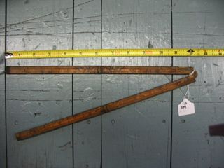 Folding ruler made of wood and brass